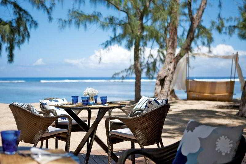 Lux* Saint Gilles Resort Exterior photo Beachfront dining at the resort